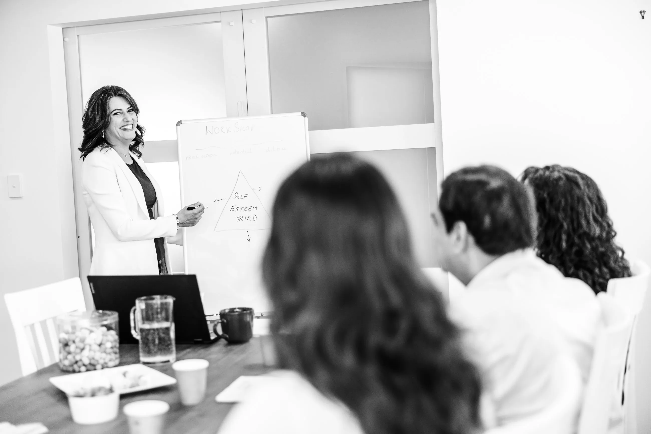 Meher leading a wellbeing workshop at Aurea Health